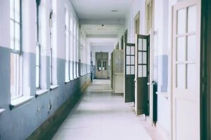 Jail hallway with doors open